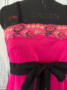 Vibrant Pink Mini Dress with Black Bow