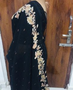 Elegant Black Saree with Floral Border