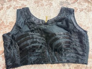 Embellished Padded Sleeveless Blouse