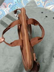 👜