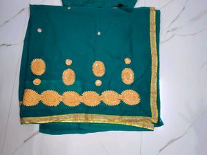 Elegant Teal Saree with Golden Embroidery