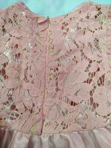 A Used Baby Girl Peach Color Frock
