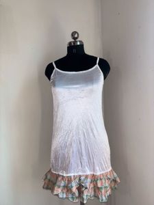 White Slip with Ruffled Hem