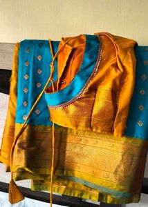 Stunning Teal Saree with Gold Accents
