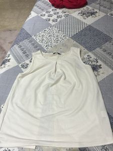 Elegant White Sleeveless Top size L
