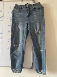 Distressed Blue Denim Jeans
