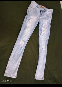 Light Wash Distressed Denim Jeans