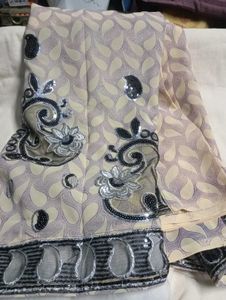 used Elegant net Sequined Saree.without blouse