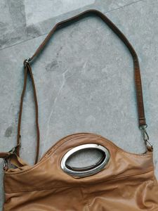 Chic Tan Leather Shoulder Bag with Flower Detail