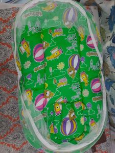 Baby bed with mosquito protection
