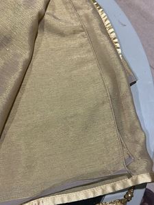 Elegant Golden Saree with Embellishments