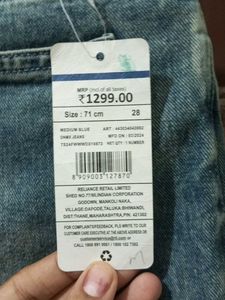 Distressed Blue Denim Jeans
