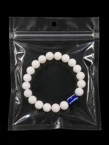 White Beaded Bracelet with Blue Accent