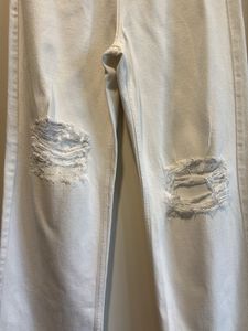 Cream Distressed Wide-Leg Jeans