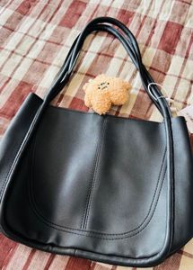 Stylish Black Hobo Bag with Charm