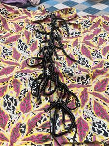Vibrant Floral Print Lace-Up Blouse
