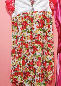 Floral knee Length Dress. Sleeveless. Sleeves Are Attached For Image Purpose Only. Will Fit Bust 34, 36, 38, 40.