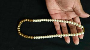 Elegant Pearl and Amber Beaded Necklace