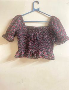 Off-Shoulder Smocked Peplum Top. size
