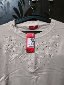 Elegant Embellished Knit Top