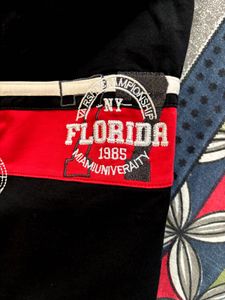 Men's Black Polo Shirt with Red Stripes