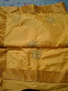 Elegant Yellow Silk Saree with Gold Border