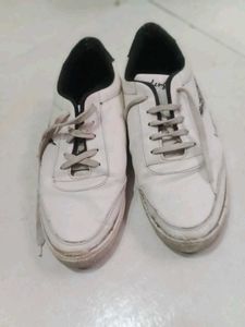 White Sneakers with Feather Design