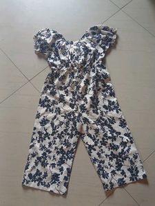 Chic Floral Jumpsuit with Bow Detail