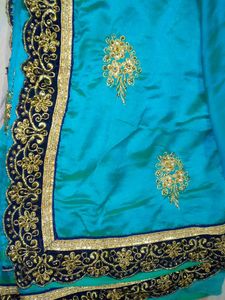 Elegant sea green Embroidered Saree