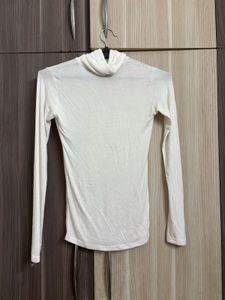 OZBRIDGE SHEER TURTLE NECK TOP