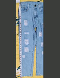 Ripped Light Wash Raw Hem Mom Jeans