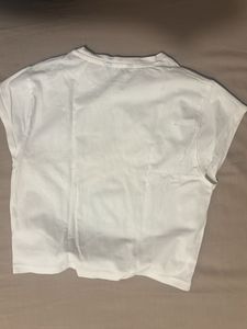 White T-Shirt with Pink Flower Graphic