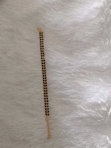 Gold and Black Herringbone Bracelet