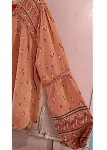 Branded Top With Pretty Colour N Beautiful Sleeves... Suitable For Summer