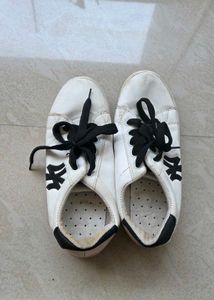 Classic White Sneakers with Black Accents