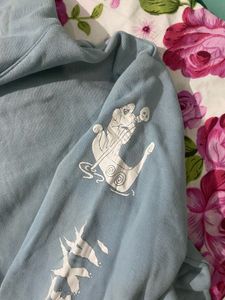 Light Blue Hoodie with Graphic Sleeve