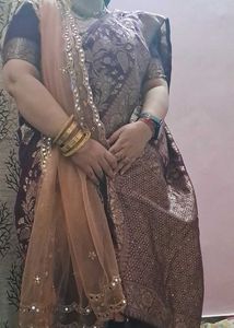 Elegant Purple Saree with Intricate Gold Weave