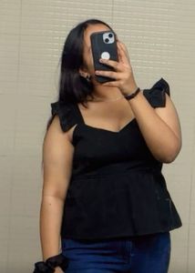 Black top sleeveless elegant looking