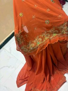 Embroidered rust Orange Saree