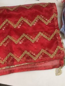 Silk green colour Anarkali salwar with red colour Shawl.Used only once good condition