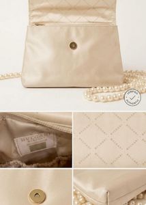 BVlgari Elegant Cream Clutch Bag