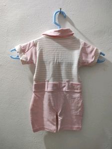 BKIDS small size boy's dress look like romper in pink and white color combination.