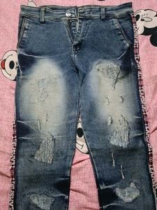 Distressed Blue Jeans with Side Stripe