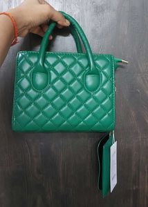 Quilted Green Handbag with a extra sling and pouch