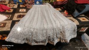 Stunning Sequined Grey Lehenga choli with dupatta.