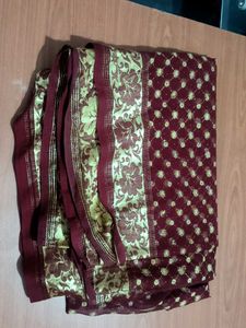 Elegant Burgundy Saree with Golden Floral Border