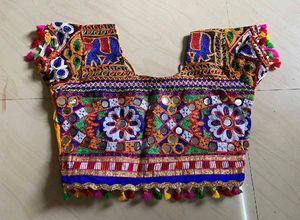 Vibrant orange &amp; Blue Embroidered Lehenga Choli