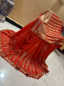 Vibrant Orange Sequined Saree