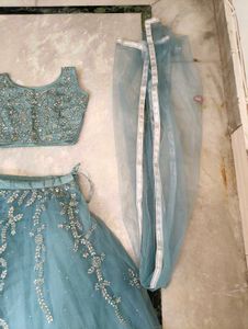 Elegant Blue Embellished Lehenga Choli.