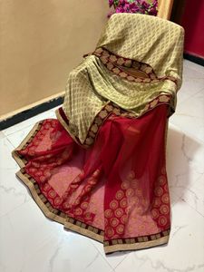Elegant Cream and Red Saree with Gold Border